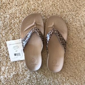 Animal print flip flops.